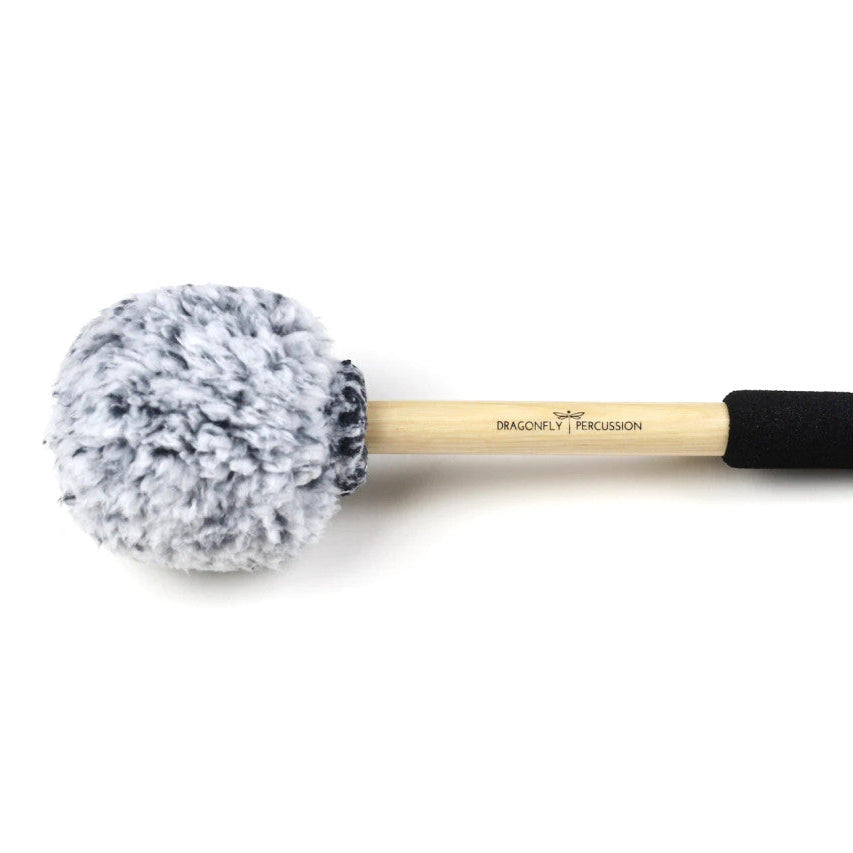 Dragonfly Fuzzbucket percussion mallet with a black and white foam head on a white background
