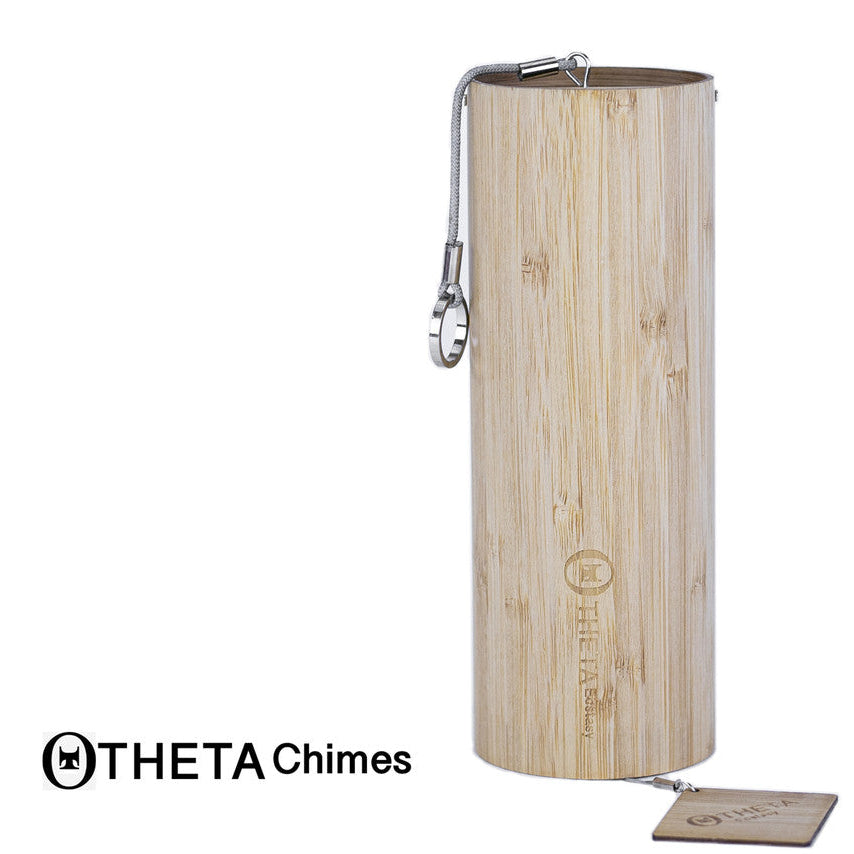 Wooden chime with Theta Chimes logo on a white background