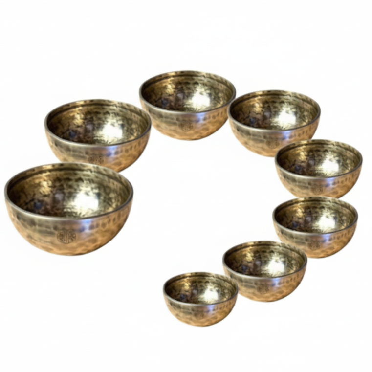 Set of 8 Himalayan singing bowls on a white background