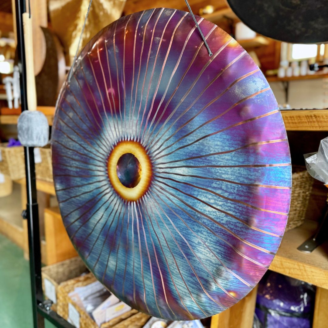 colorful handheld gong in a store setting